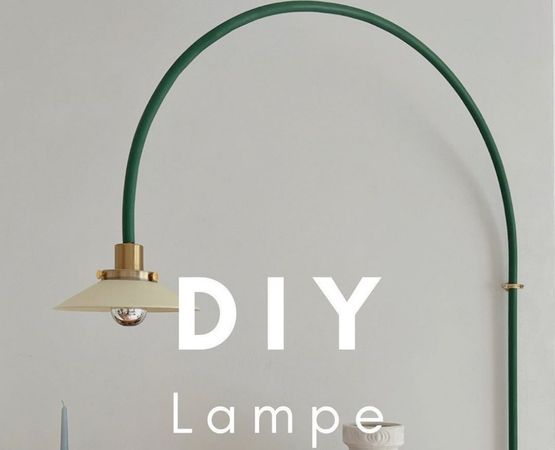 DIY green design lamp with minimalist arched structure