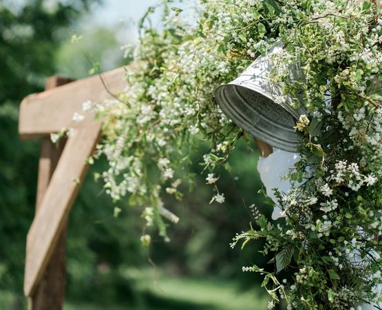 country wedding decoration with flowers and vintage objects in a romantic, natural atmosphere