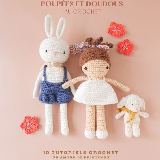 Three crocheted cuddly toys - a rabbit, a little girl and a lamb - presented with crocheted flowers on a pink background.