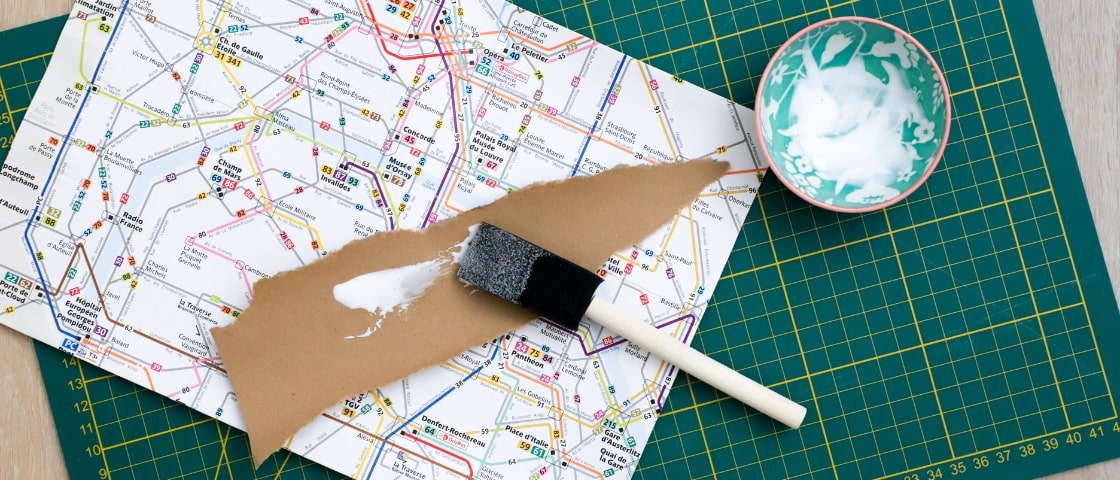 Handmade DIY travel journal materials: collage on paper