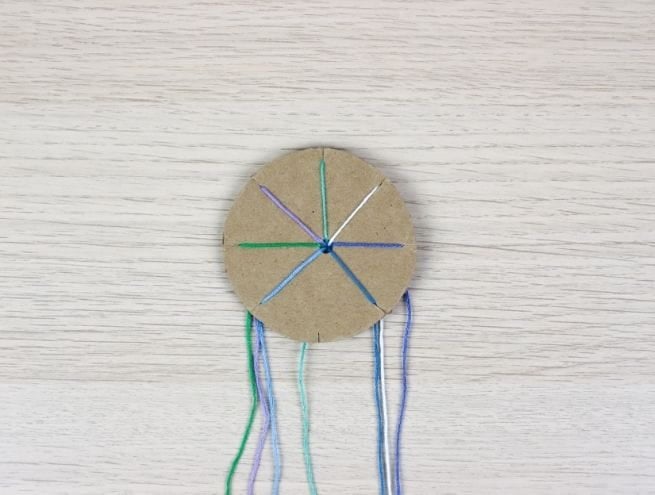 Etape 3 du tuto bracelet kumihimo