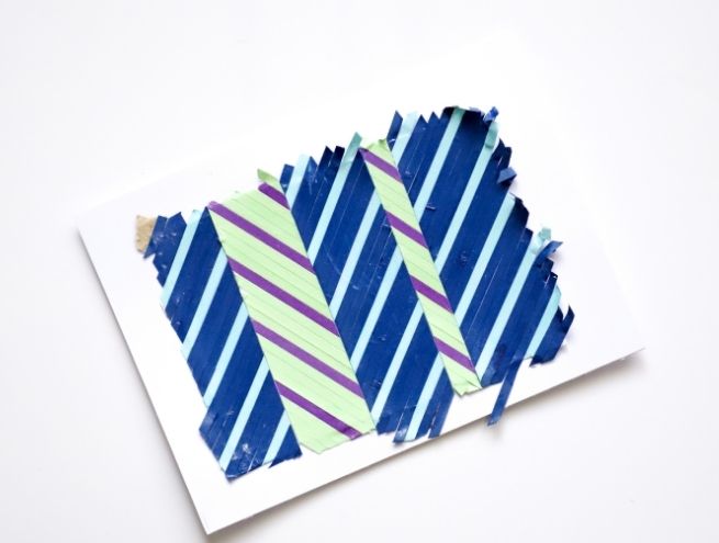 Final creation in paper marquetry with blue and green graphic motifs