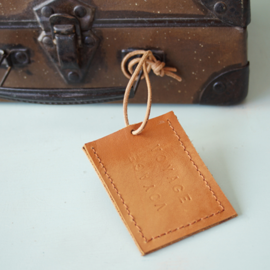 Etiquette de voyage en cuir